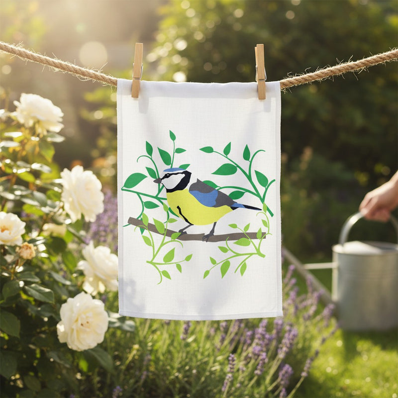 Blue Tit in a leaf wreath Tea Towel