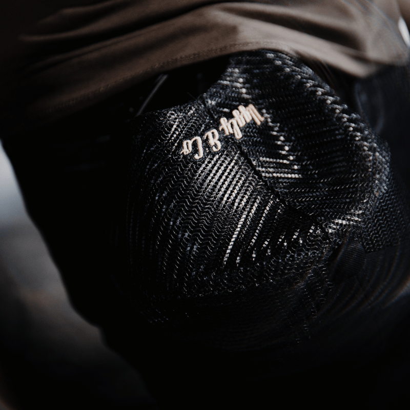 Black Flat Track Trucker Hat