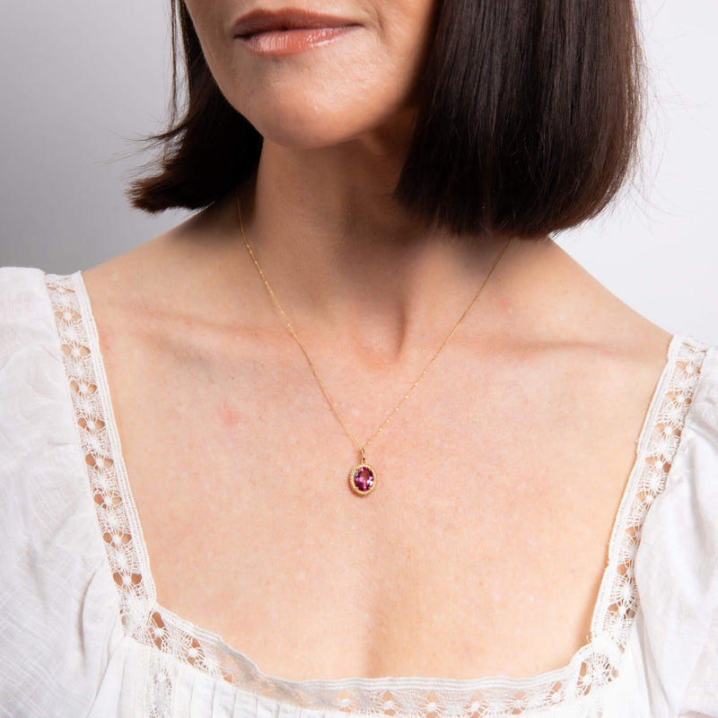 Elements Gold Oval Cut Pink Topaz Pendant
