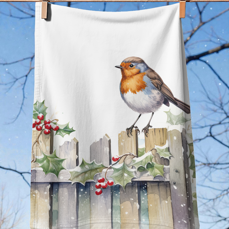 Robin on a fence in the snow Tea Towel